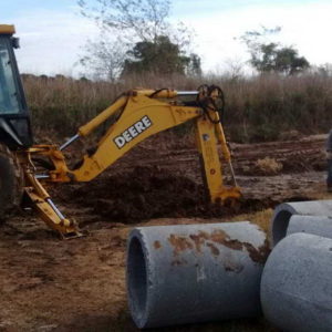 Colocación de tubos y secado de pozos en Zona 1